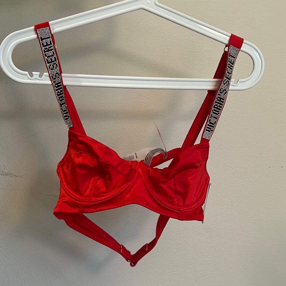 Red Victoria’s Secret swimsuit with gemstones